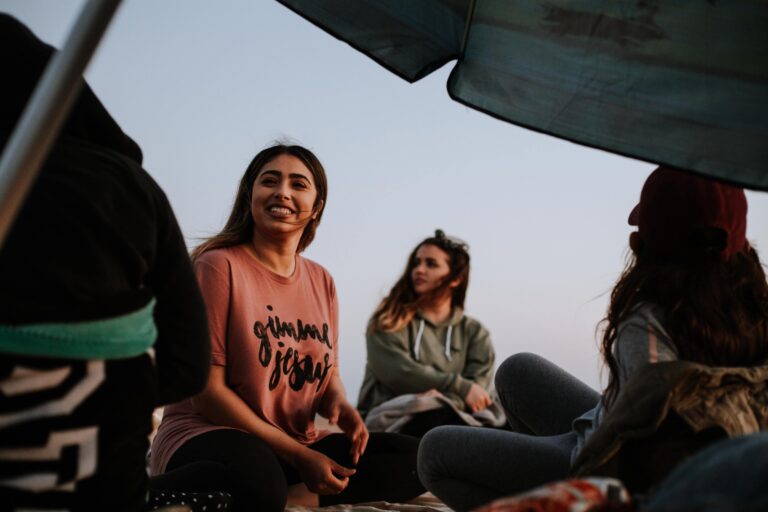 group of people sitting and talking