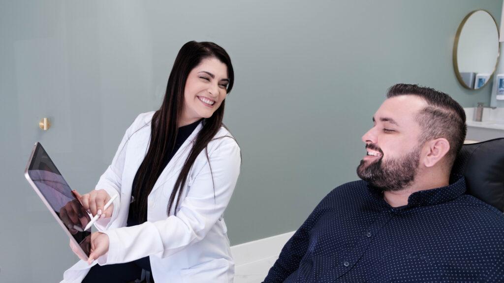 Dr. Susel Perez smiling during a dental consultation.